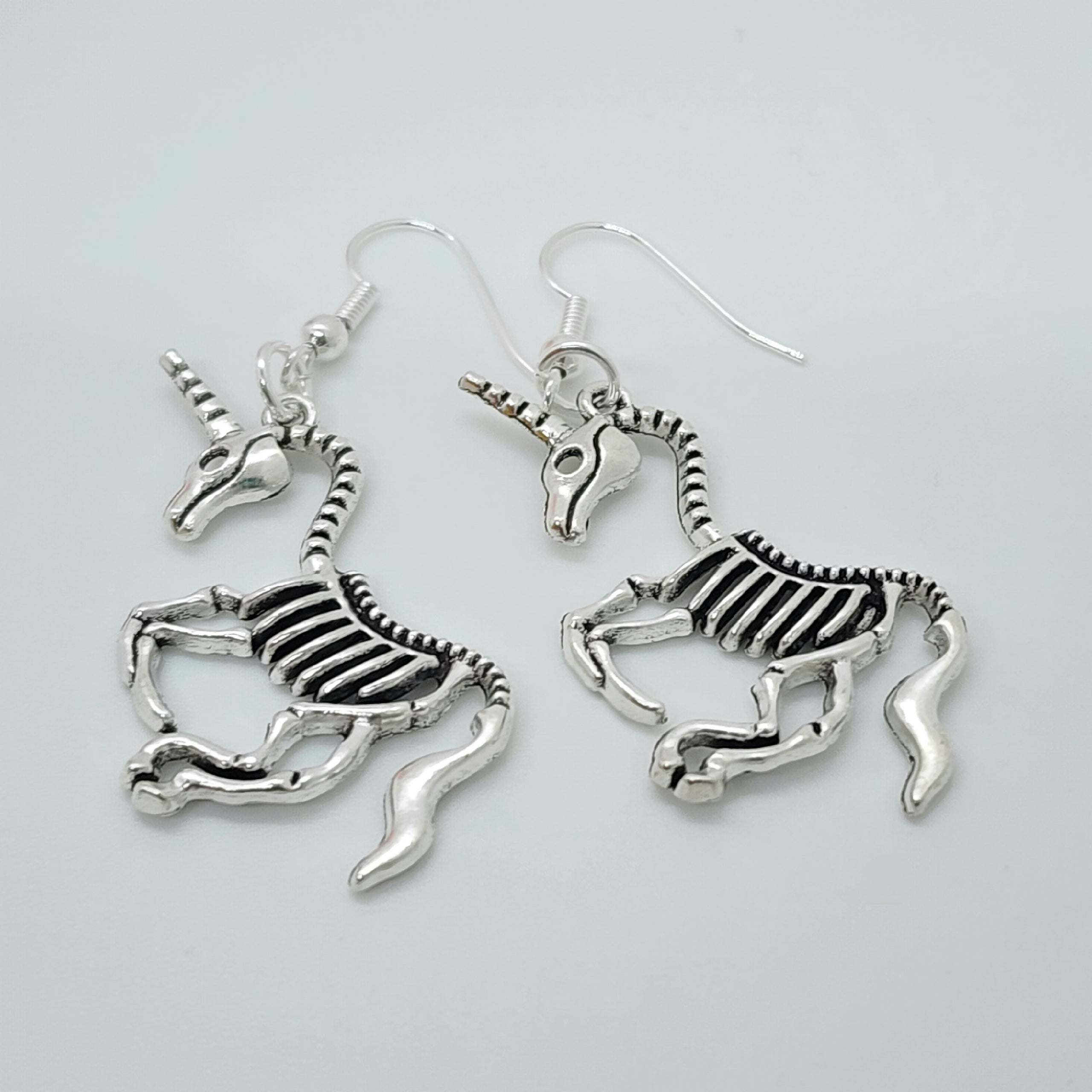 Unicorn Skeleton Earrings More Than White Design